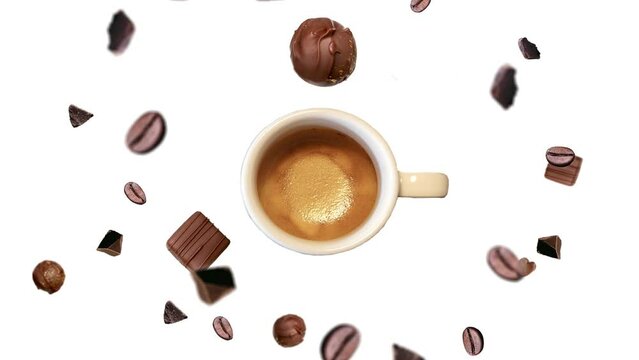 Flow of many different direction and size chocolate chips and coffee beans on a white background. The Concept of Creative motion Design Template for Good morning meal beverage coffee shop.
