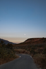 road in the desert and the moon 