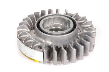 new aluminum modern flywheel close-up for a chainsaw on a white background