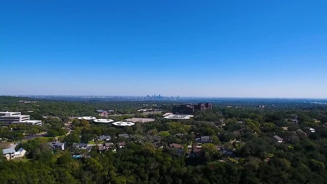 Aerial drone pushes in on Austin Texas from afar.