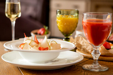 breakfast table with a variety of dishes and drinks
