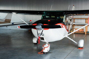 modern helicopter with propeller and airfoils on parking.