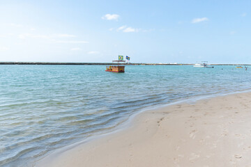 Obraz premium Muro Alto beach, a paradise famous beach of Porto de Galinhas, Ipojuca, with warm and calm water surrounded by a reef wall.