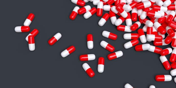 red and white pharmaceuticals drugs capsules 3D computer generated