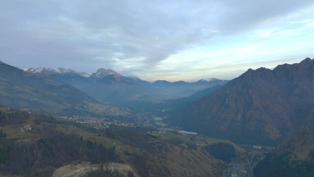 Beautiful aerial view of the Seriana valley and its mountains at sunrise, Orobie Alps, Bergamo, Italy