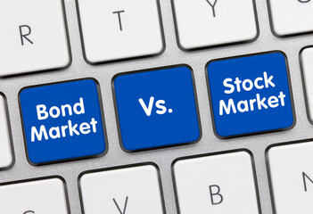 Bond Market Vs. Stock Market - Inscription on Blue Keyboard Key.