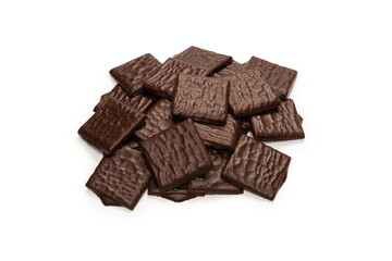 Dark chocolate candies isolated on white background.