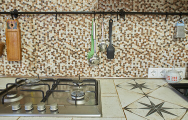 Modern kitchen wall interior trend with kitchen accessories.