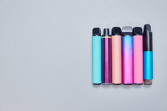 electronic cigarettes top view. background with copy space
