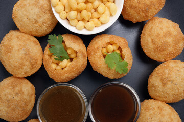 Tadeonal subcontinental street snack food boondi chickpeas potato Dahi Puri Chaat pani puri fuska...