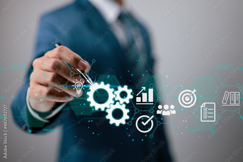 Poster In the hands of a businessman, a virtual innovation. Business Process and Problem Solving, Workflow Monitoring and Evaluation as well as Quality Control are all part of Operations Management.