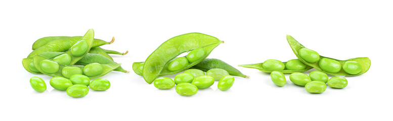 Green soybeans in wood spoon isolated on white