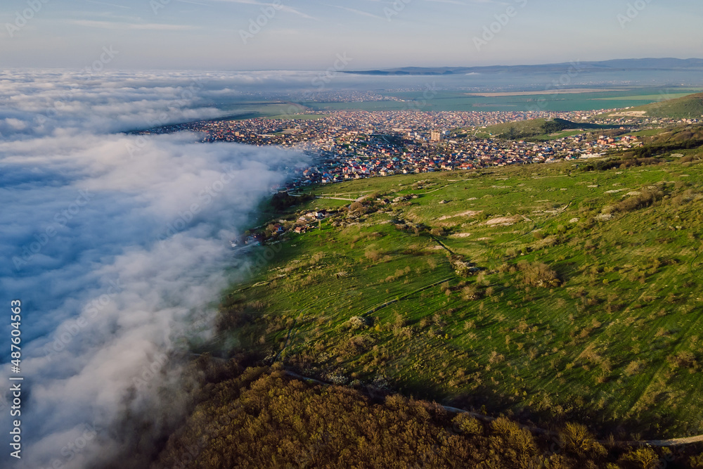 Wall mural Aerial view with fog and town in Anapa. Foggy weather