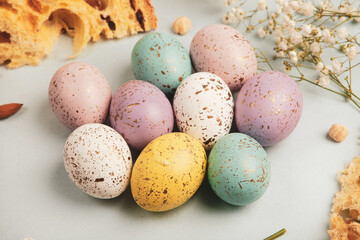 Hand painted pastel colored Easter eggs background. Happy Easter greeting card or invitation.