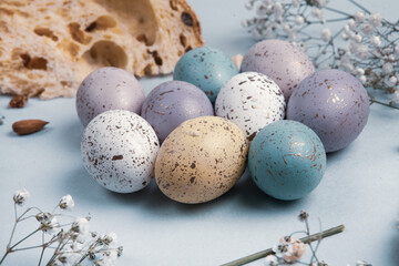 Hand painted pastel colored Easter eggs background. Happy Easter greeting card or invitation.