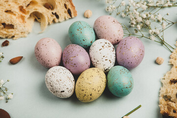 Hand painted pastel colored Easter eggs background. Happy Easter greeting card or invitation.