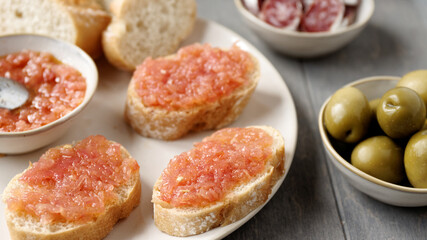 Bread with tomato (Pa amb tomaquet). Typical Catalan sandwich with grated tomato with olive oil.