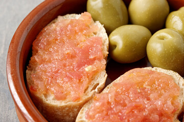 Bread with tomato (Pa amb tomaquet). Typical Catalan sandwich with grated tomato with olive oil.