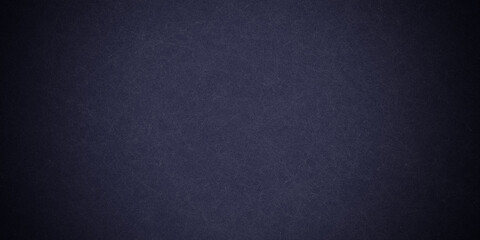 Dark blue background texture with black vignette in old vintage grunge textured border design, dark elegant teal color wall with light
