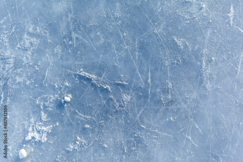 Aufkleber empty ice rink with skate marks after the session outdoor. skating ice rink texture covered with sno