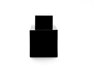 Black bottle for toilet water or perfume on an isolated white background.