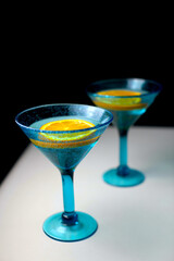blue martini glass on a dark background