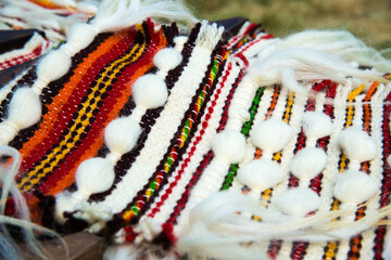 Traditional Bulgarian woolen hand-woven carpet - selective focus