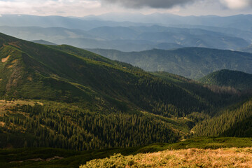 Landscapes in the mountains during autumn, hiking trails in the Carpathians, picturesque and authentic landscapes.