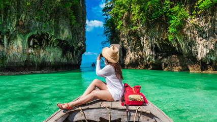 Traveler woman on boat with camera joy nature scenic landscape Ko Hong island Krabi, Attraction...