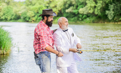 Personal instructor. Fish with companion who can offer help in emergency. Bearded man and elegant...