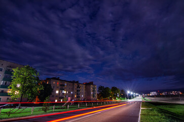 time lapse of clouds over city