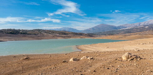 view of Lake Vinuela in the backcountry mountains of Malaga Province in southern Spain