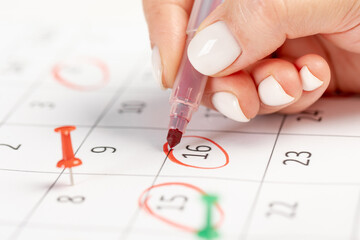 Calendar marks date with red marker. business meeting appointment date