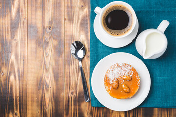 Cake with coffee and cream.