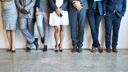 Be so good they cant ignore you. Cropped shot of a group of unidentifiable businesspeople standing in line while waiting to be interviewed.