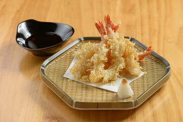japanese food Deep Fried ebi tempura shrimp in a tray with chili sauce on wooden background top view