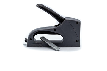 Obraz premium stapler with cartridges on a white background