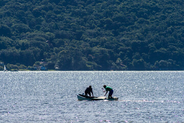 Santa Catarina, Brazil, April 16, 2009. Fishermen on Conceicao Lagoon in Florianopolis city, Santa...