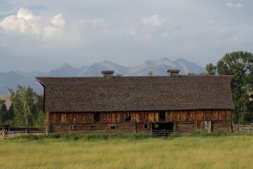 Barn with mountains in background