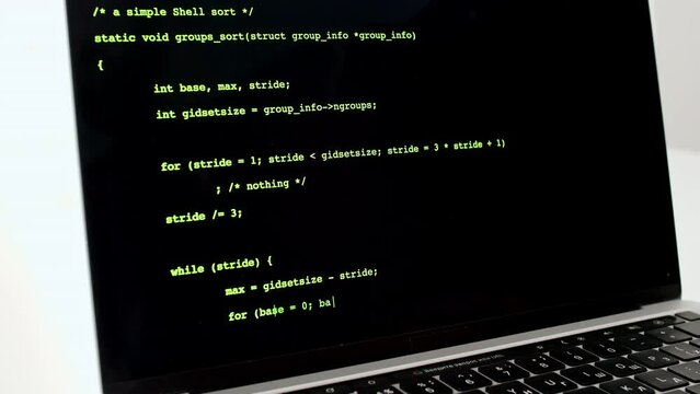 Developer is browsing html code on the computer screen. Scroll of HTML Web Page Code. Programming code abstract technology background. Computer script concept. High quality 4k footage