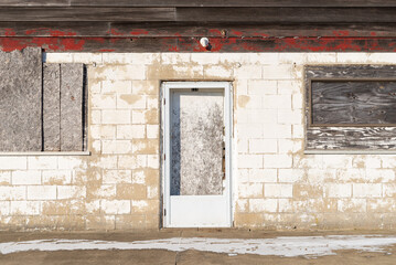Fototapeta na wymiar Old abandoned storefront.