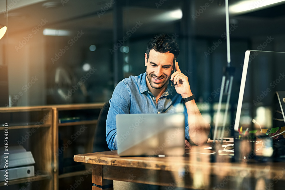 Poster inspiring productivity with a wealth of technology. shot of a young businessman talking on his phone