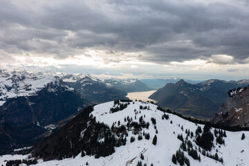 Amazing shot of a beautiful landscape in the alps of Switzerland. Wonderful flight with a drone over an amazing landscape in the canton of Schwyz. Epic view over a region called Mythenregion.