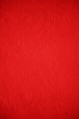 Abstract grunge decorative red stucco wall background.