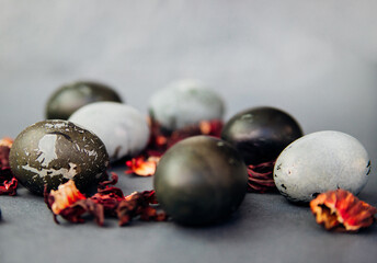 Painted Easter eggs with the effect of marble stone, painted with natural hibiscus tea karkade.
