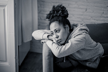 Young devastated depressed african american woman crying feeling sad, hurt suffering depression in sadness and emotional pain. Mental health in young people, bullying suicide and heartbroken concept.