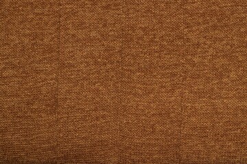 Fototapeta na wymiar brown fabric texture of a sofa