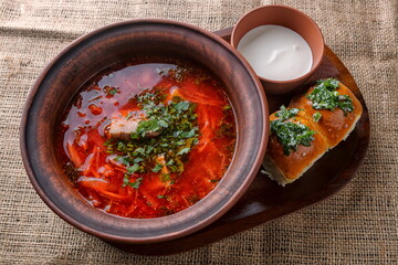 Ukrainian borscht with donuts with garlic and sour cream