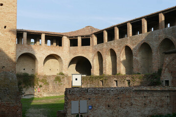 Sforza Castle in Imola, the inner courtyard with the tower and the raised patrol walkways
