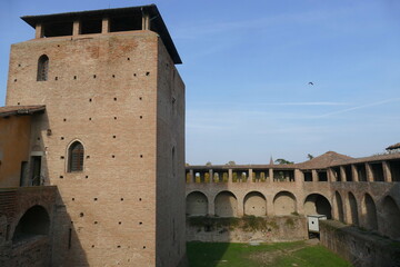 Sforza Castle in Imola, the inner courtyard with the tower and the raised patrol walkways